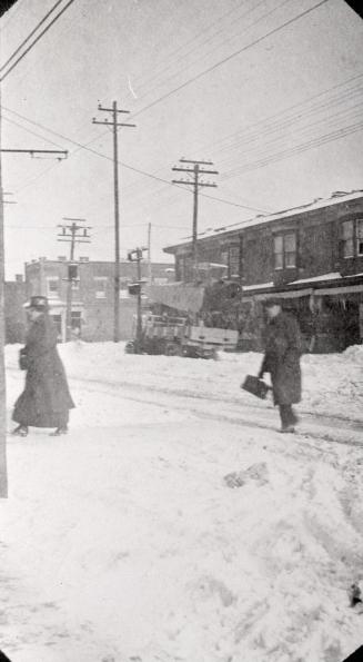 Yonge Street looking north to Ranleigh Avenue. Image shows a few people crossing the street in …