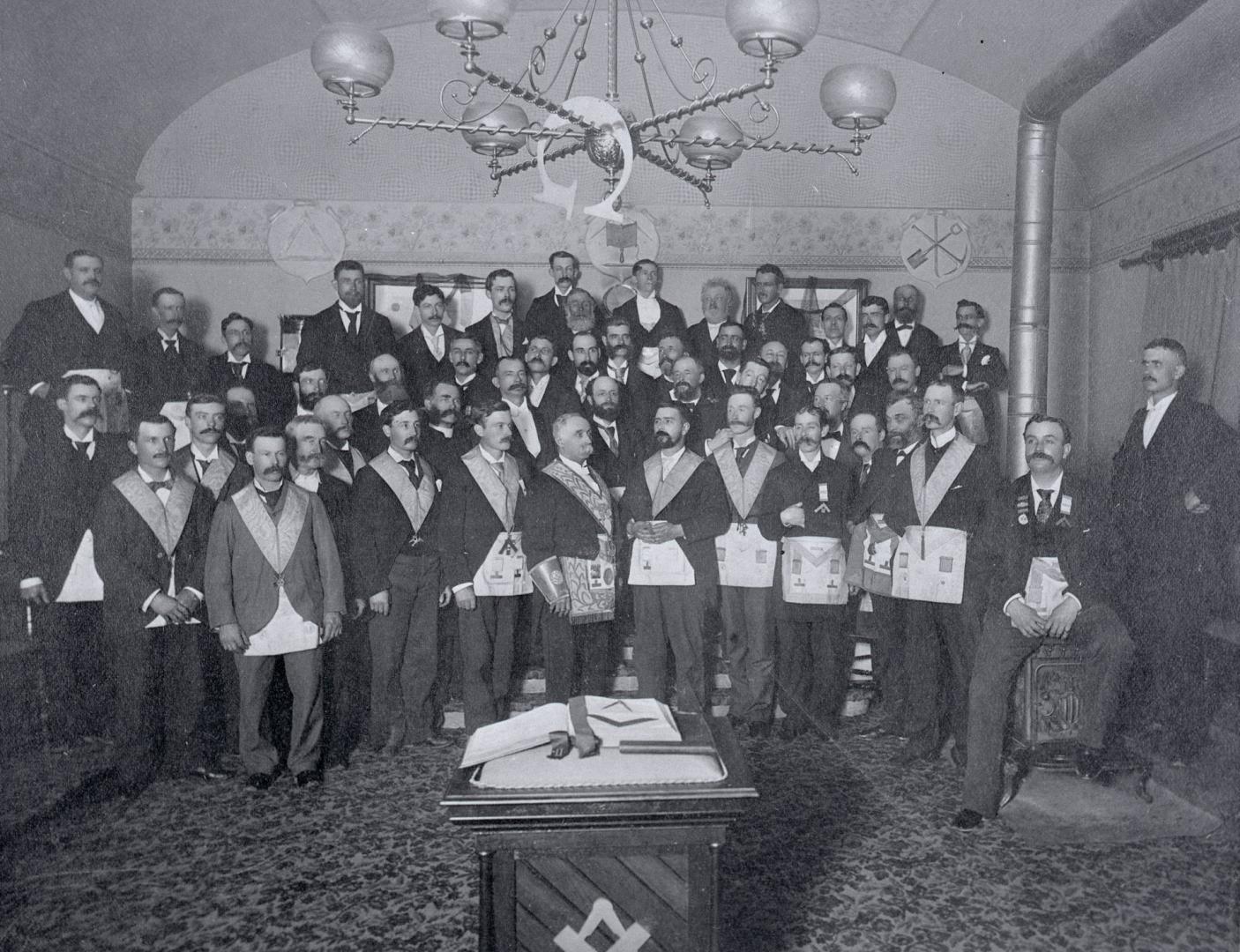 Freemasons, York Lodge. Image shows a big group of freemasons standing in four rows.