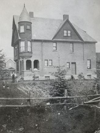 House, Glengrove Avenue West, south side, west of Heather Street. Image shows a big three store…