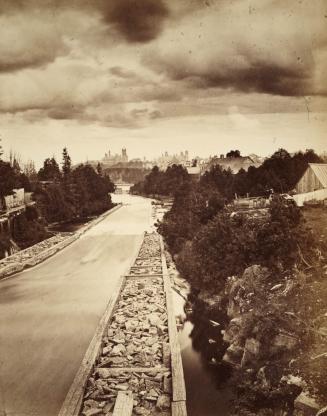 Timber slide, showing Parliament Buildings in background