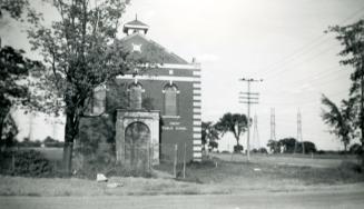 Emery Public School, Toronto, Ontario. Image shows a partial front view of a two storey buildin…