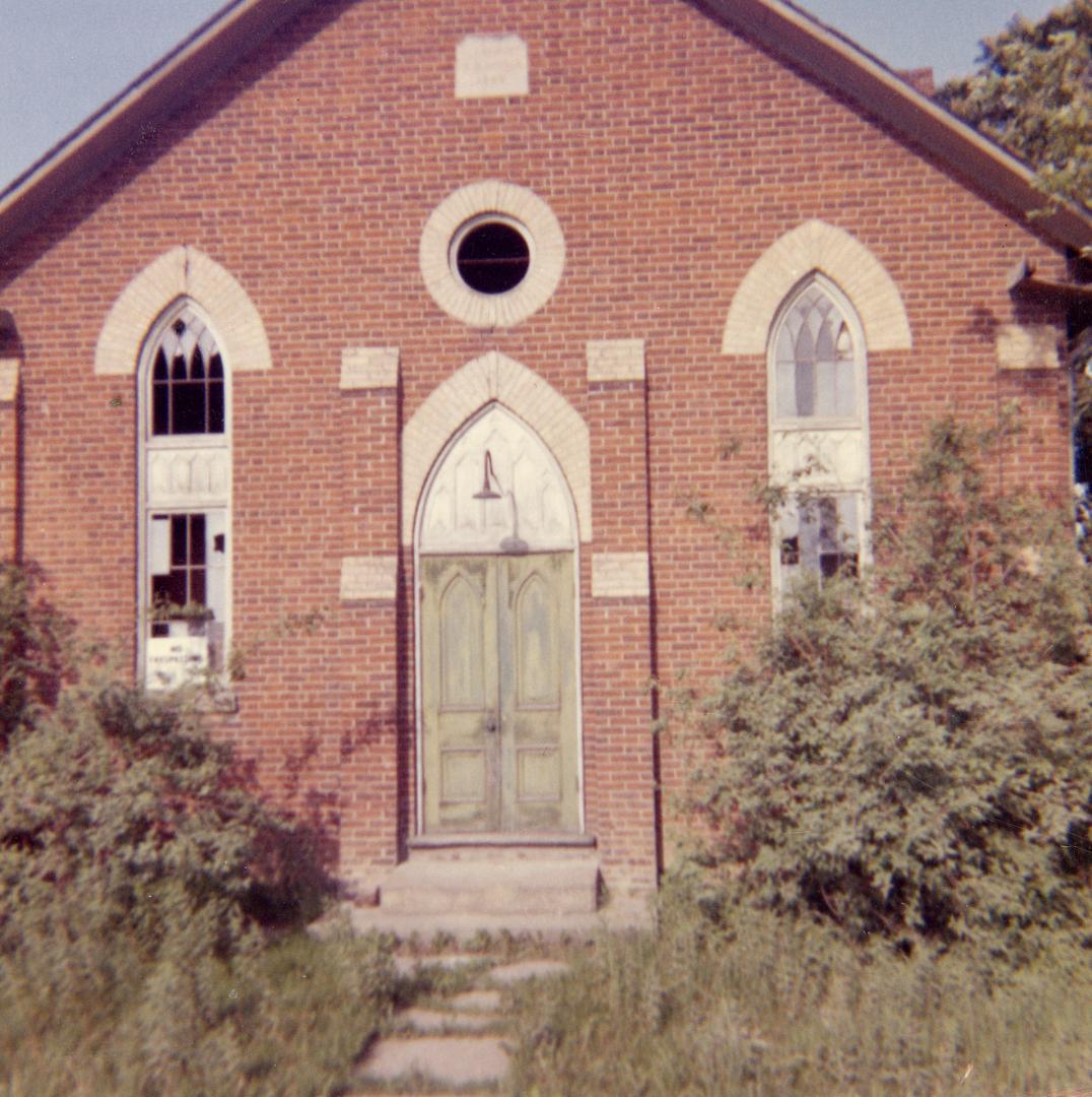 Image shows a partial front view of the Claremont Wesleyan Methodist Church, 1869 (beside Emery…