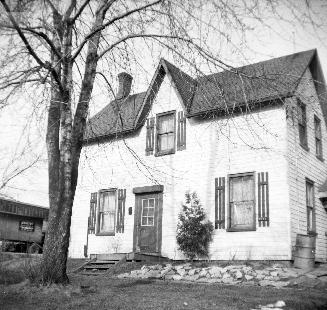 Riley House, Toronto, Ontario. Image shows the front view of a two storey residential house. Th ...