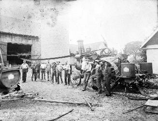 Outfit of James E. Hill threshing at the home of John McKenzie