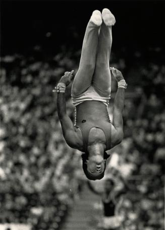 Alan Nolet of Canada's men gymnastic team flips