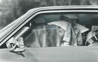 Big-Brimmed hat is hazardous for the driver because it blocks side vision