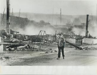 Neat picket pence stands unmarked by the fire in Cobalt yesterday that left the home it guarded and dozens more a pile of smouldering ashes. A residen(...)