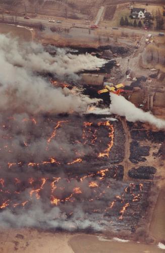 Blazing tires spew toxic smoke