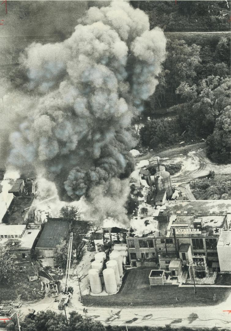 Smoke and flames mushroom from big fire at Polyresins plant on Beachwood Dr