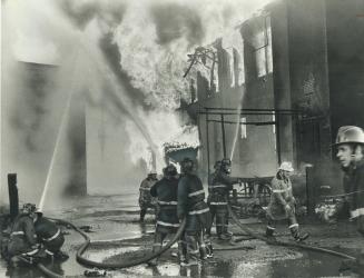 Fed by rubber tires, flames belch from $900,000 warehouse-factory fire on Liberty St