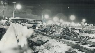 Wreckage of TTC bus lies strewn along tracks after being hit by go train