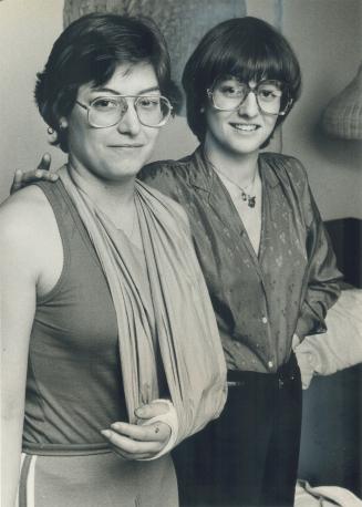 Thrown to tracks: Nancy Everell, 25, (left) was pulled from the tracks in High Park subway station by Donna Gerstmann, after a man rushed onto the nearly empty platform and pushed her over the edge