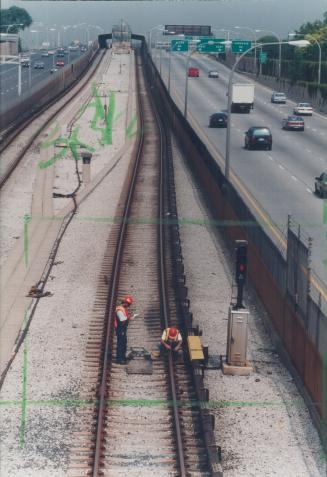 TTC Workers check equipment on Spadina line