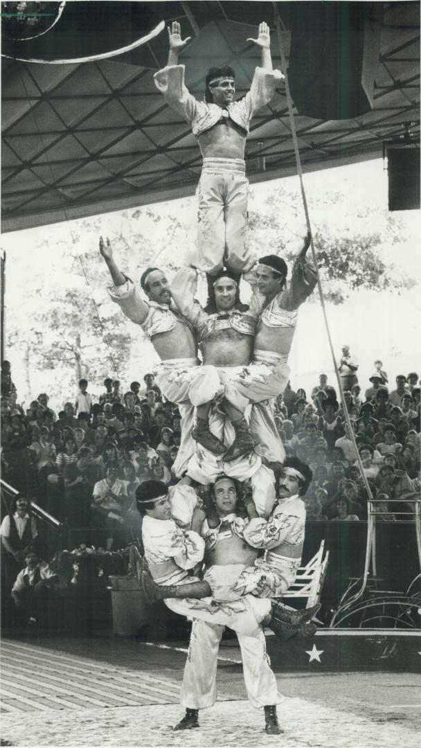 Pyramid power. The Tangier Troupe, part of the Ford Family Circus appearing daily at the Ontario Place Forum until Sept. 3, had crowds cheering yesterday with this dazzling acrobatic pyramid