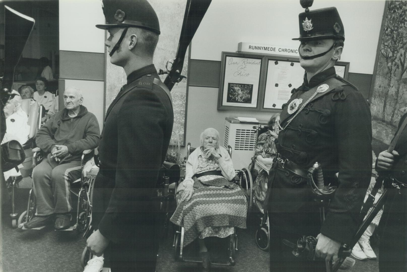 Lest we forget. Members of the Queen's Own Rifles of Canada regiment stand solemnly on parade during a Remembrance Day service for residents of Runnym(...)