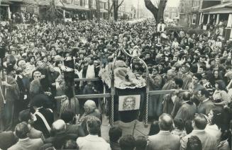 Good Friday procession: Thousands of people clustered around the main statue of portrayed of Easter message in a procession which attracts up to 10,000 spectators in