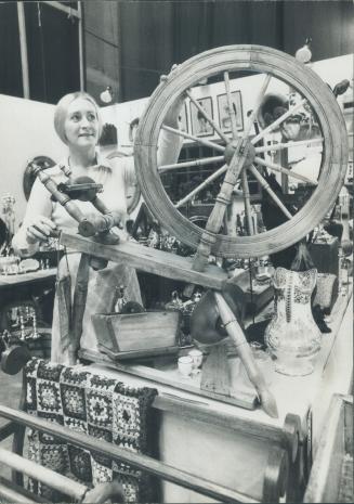 The old spinning wheel gets pride of place in one of the boutiques at the Wimodausis Club's annual Toronto Antique Show which opened for its preview l(...)