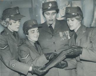 Army girls marched off with the precision drill trophy last night, after competing with the Red Cross and the navy