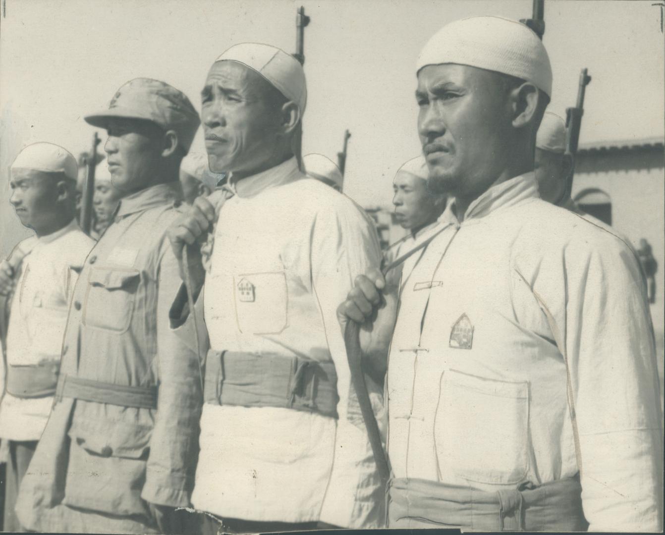 China is full-of-feudal warlords of greater and lesser potentialities, all maintaining troops like these husky looking soldiers above. They are all fi(...)