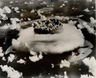 Atomic bomb explodes in underwater test made at bikini