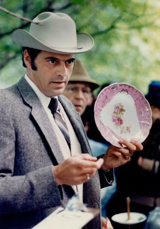 Clockwise from above left, Bob Severn auctions a Victorian plate