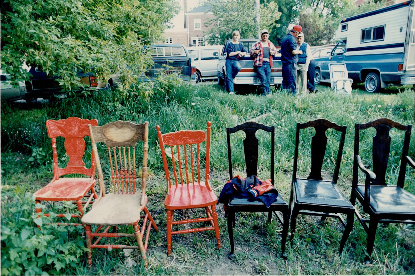 Assorted chairs are up for bidding