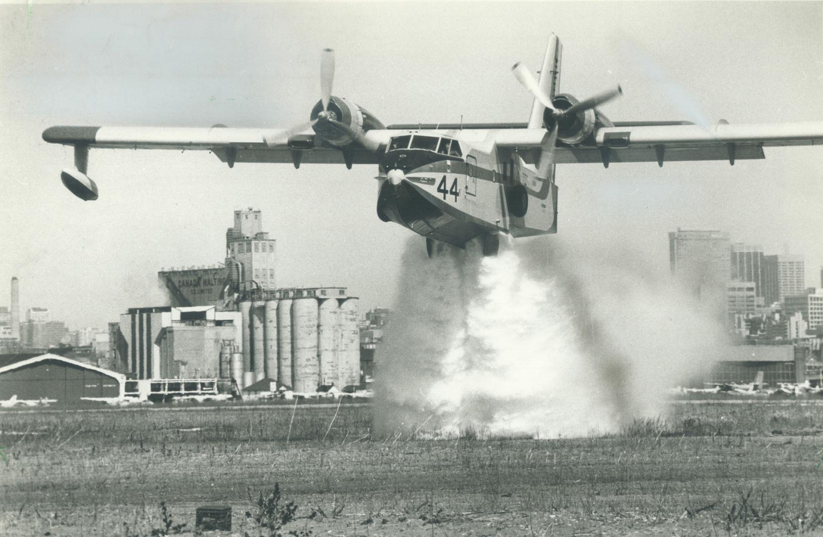 Where's the (forest) fire? The forest fire-fighting Canadair CL-215 water-bomber shows its talents in a demontration yesterday at Toronto Island airpo(...)