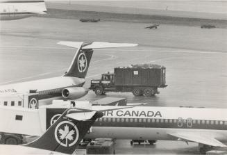 Waste removal: A Disposal Services truck collects and hauls garbage from overseas flights arriving at Pearson international Airport's Terminal One