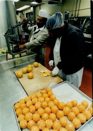 Peeling oranges