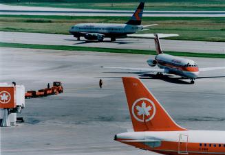 Hollis Harris: Air Canada chief, left, will be a key in merger talks