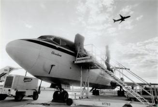 Package deal: A Federal Express freighter, named after an employee's child, awaits takeoff to Memphis