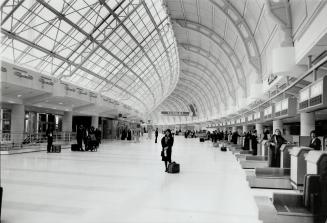 Terminal Three: Modeled on the shopping mall, Trillium Terminal at Pearson Airport is a massive glass-and-steel stage for armies of fliers