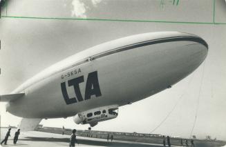 This big silver 'blimp' hovered over Toronto International Airport on its maiden voyage yesterday afternoon