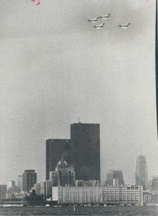 Ready for a pass: U.S. Navy Skyhawk fighters sweep over the Toronto waterfront prior to giving a demonstration of tactical formations for 100,000 peop(...)