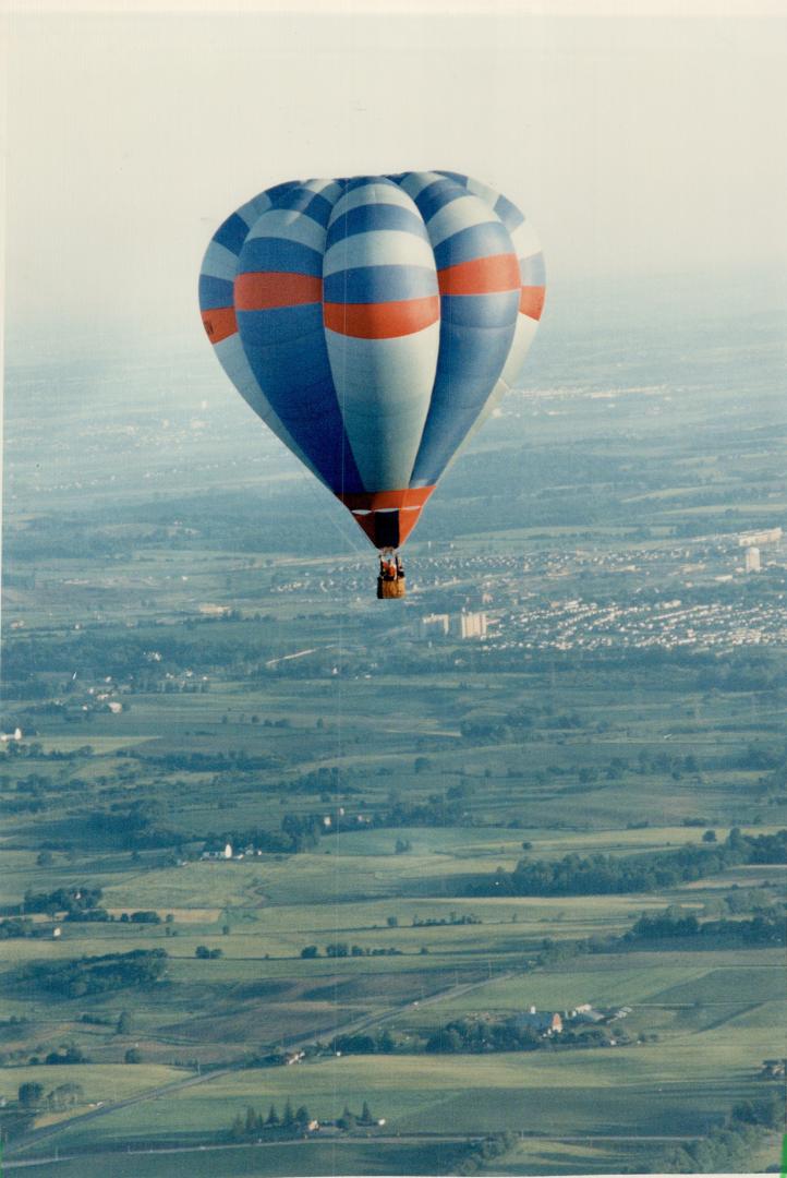 Lots of hot air on the way. Ken Rolland of Free Flight Balloons Ltd. takes passengers for a ride in a hot air balloon over Newmarket. This weekend, ba(...)