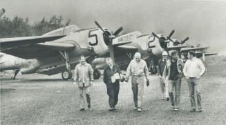 Pilots fly converted Grumman Avenger torpedo-bombers on twice-daily missions against the spruce budworm larvae attacking New Brunswick's forests