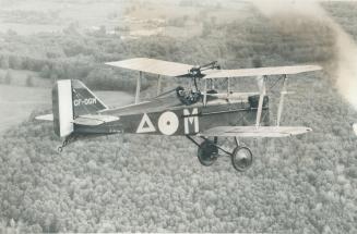 Flying high over the Caledon Hills in a replica of a World War I British-built SE5-A fighter plane is Toronto boradcaster Bill McVean, who is a member(...)