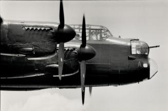 Salute to past: A restored Avro Lancaster bomber takes a run over Hamilton yesterday in preparation for the Hamilton international Air Show, June 17-18