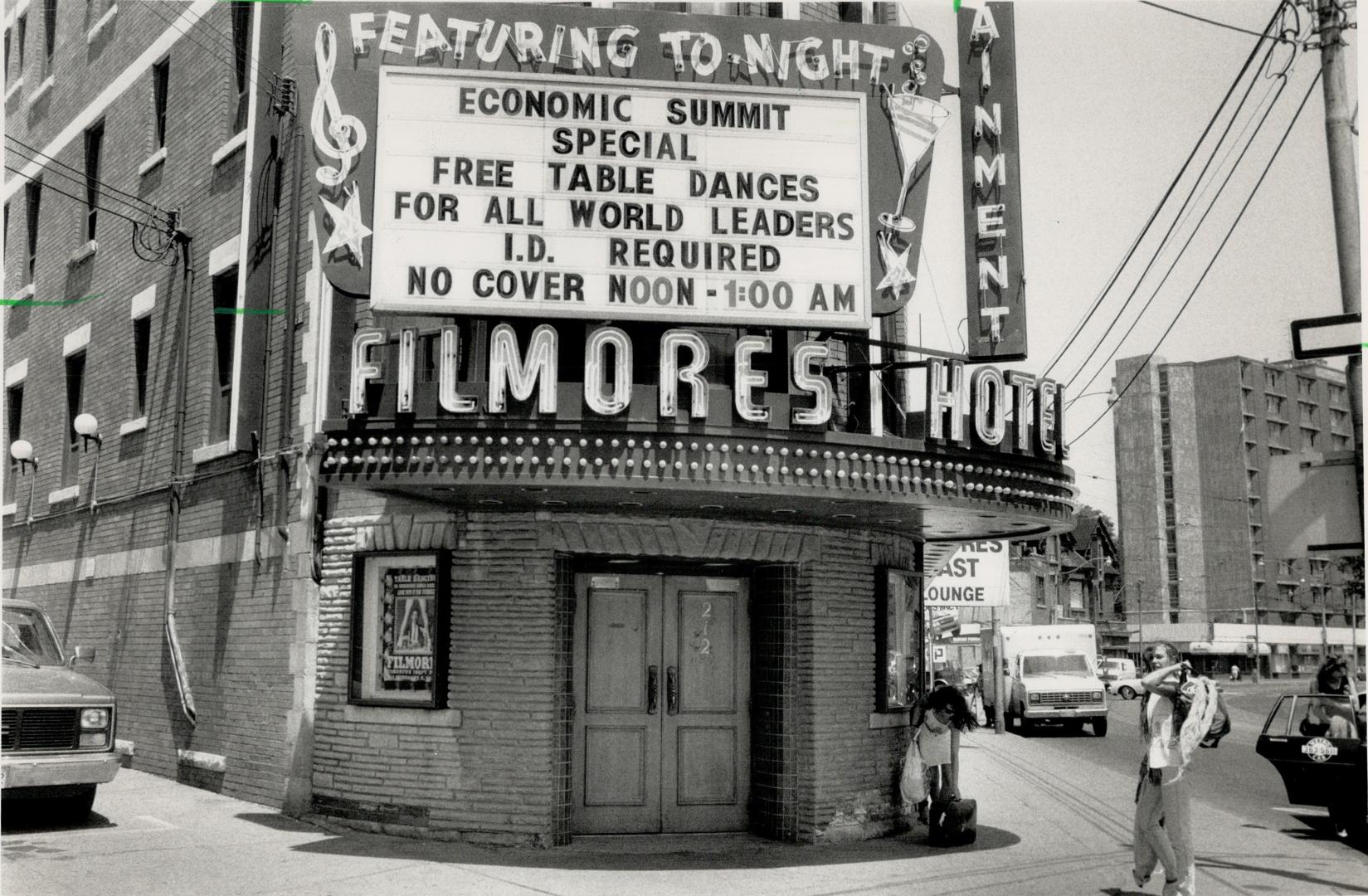 No G-7 strings attached. A Dundas St. E. strip joint advertises a special-offer invitation to world leaders attending the Economic Summit, which begin(...)