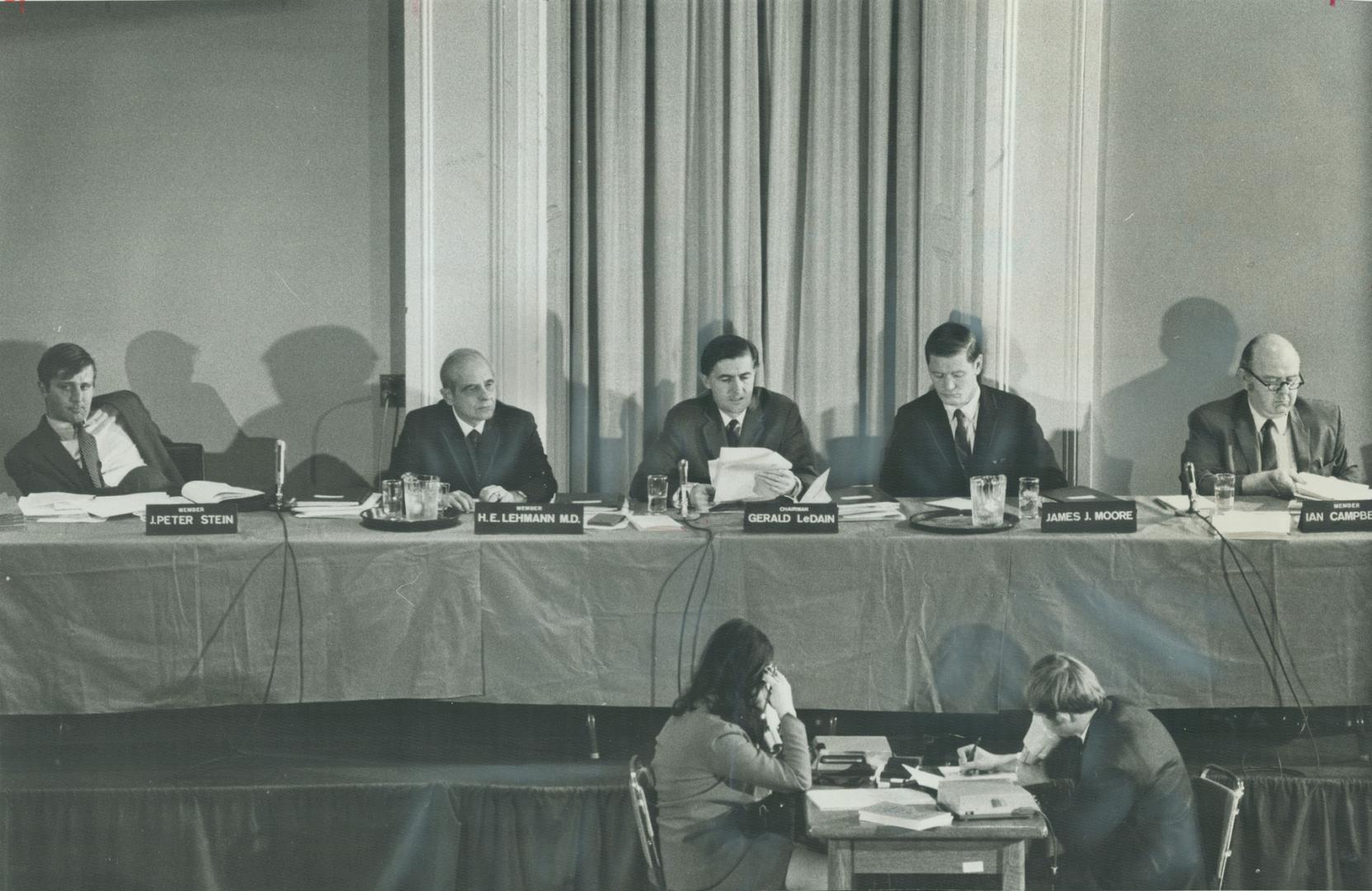 LeDain royal commission on the Non-Medical Use of Drugs listens to evidence during its opening session in Toronto last October. Members of commission (...)