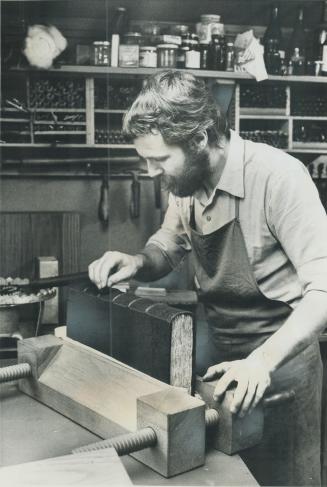 . . . gilt edged books are processed from small packets of gold which now cost Michael Wilcox $100, expensive but rewarding work