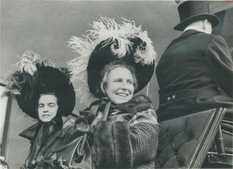 Centennial Bonnets with feathers, Centennial bonnets are sported by Controllers June Marks (L), Margaret Campbell as they take their place in parade o(...)