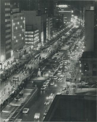 Torch-light parade marches up University Ave