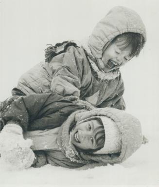 Kids delight in first snowfall