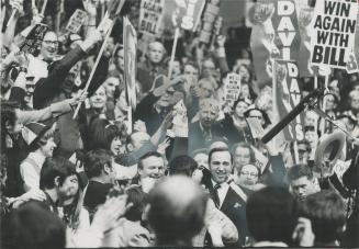 Pledging his support, Darcy McKeough (right centre) stands with William Davis after third ballot