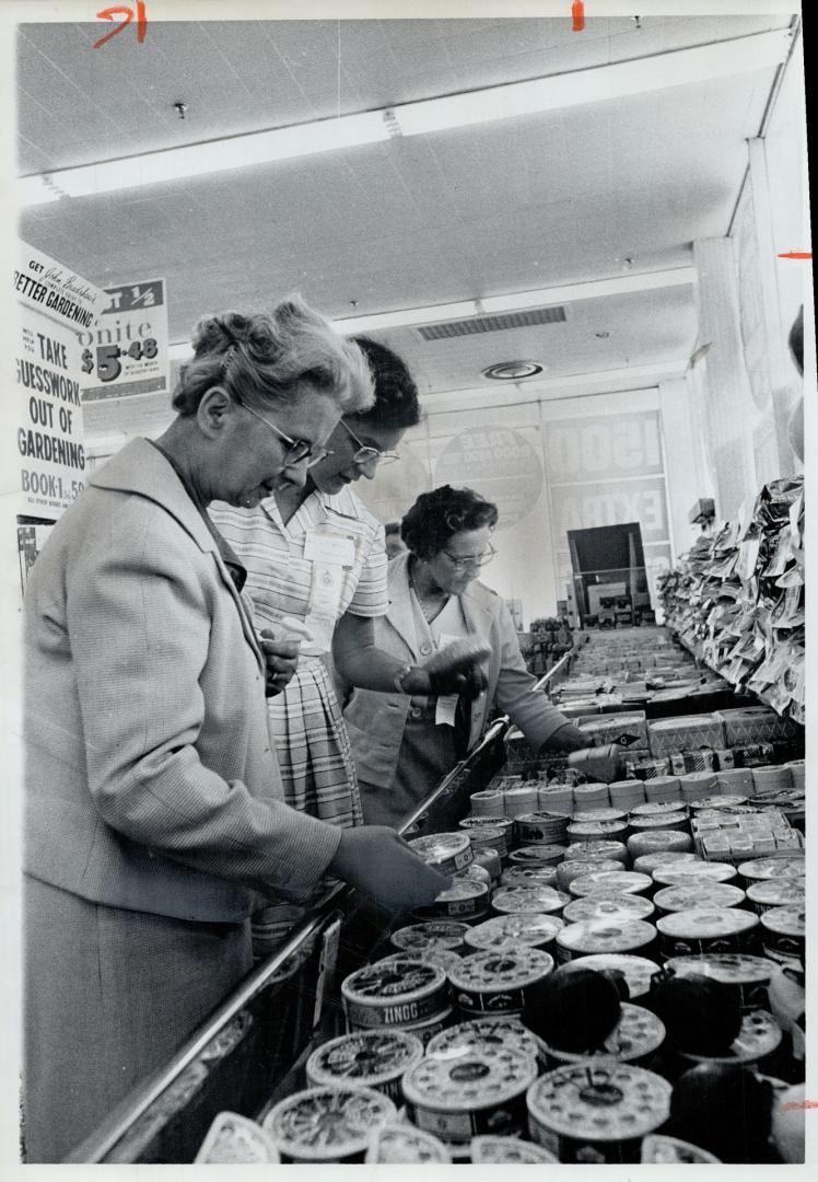 Visit to supermarket interested Mrs. F. O. Thornton, Derby, England, Mrs. J. C. Weller, Southern Rhodesia, Mrs. J. R. Park, Newcastle England