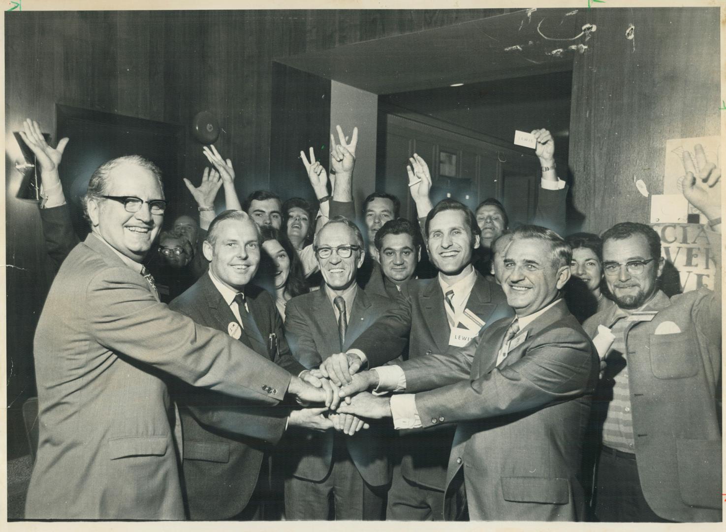 NDP's Top men- and two who want to join them - chasp hands today at Ontario New Democratic Party convention before leadership vote tomorrow. Foregroun(...)