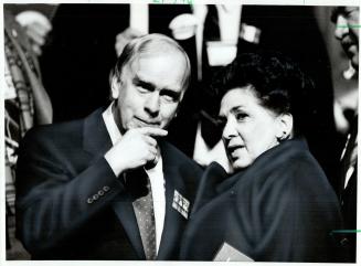 Last-minute chat: Industry Minister Frank Miller confers with Eudcation-Minister Bette Stephenson before making his speech in which he predicted economic growth for Ontario