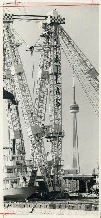 . . 2 . . 1 . . Lifttoff! No, No, the CN Tower is not headed for space, with vapor spewing from its base. It is framed on a cold day by the 300-ton he(...)