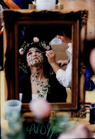 Rose Natale puts finishing touches of Filomena Sorrenti's makeup as students learned the beauty biz yesterday at a competition sponsored by the Ontario Cosmetology Teachers Association